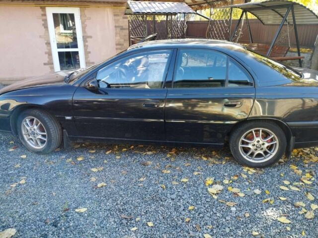 Чорний Опель Омега, об'ємом двигуна 3 л та пробігом 389 тис. км за 2500 $, фото 4 на Automoto.ua