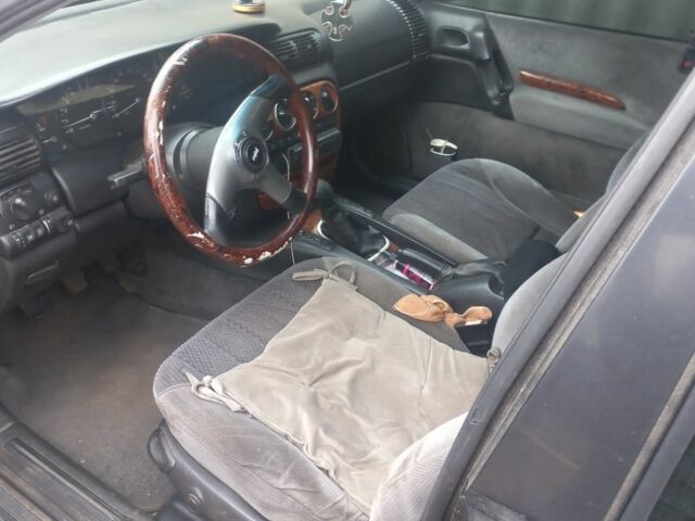 Чорний Опель Омега, об'ємом двигуна 2.5 л та пробігом 338 тис. км за 1800 $, фото 5 на Automoto.ua