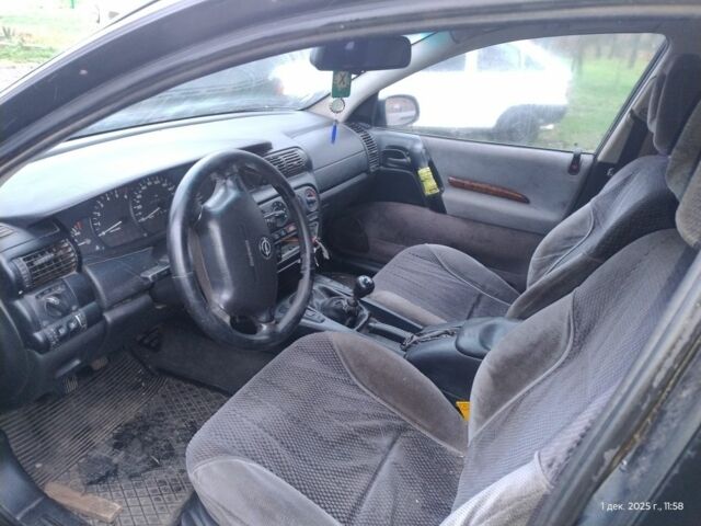 Чорний Опель Омега, об'ємом двигуна 2.5 л та пробігом 350 тис. км за 1650 $, фото 4 на Automoto.ua