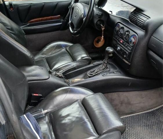 Чорний Опель Омега, об'ємом двигуна 2.5 л та пробігом 3 тис. км за 1750 $, фото 4 на Automoto.ua