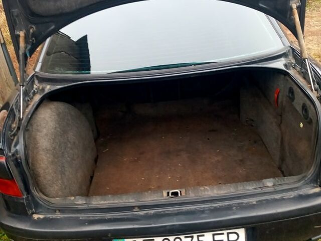 Черный Опель Омега, объемом двигателя 2.5 л и пробегом 330 тыс. км за 1300 $, фото 5 на Automoto.ua