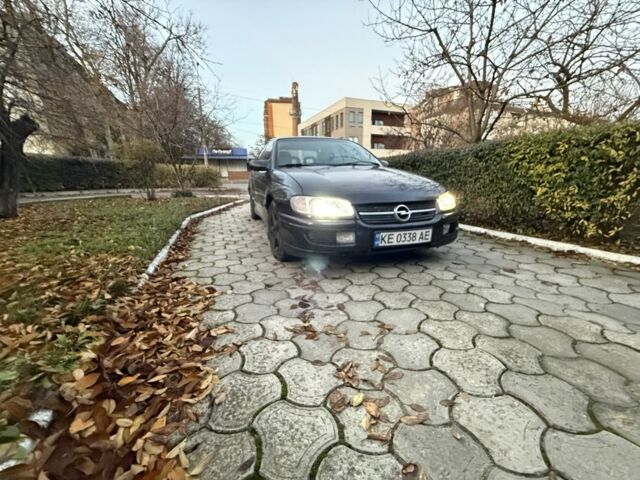 Черный Опель Омега, объемом двигателя 2.5 л и пробегом 365 тыс. км за 2200 $, фото 1 на Automoto.ua