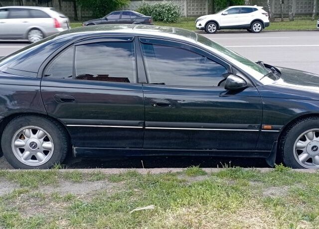 Чорний Опель Омега, об'ємом двигуна 2.5 л та пробігом 317 тис. км за 1700 $, фото 4 на Automoto.ua