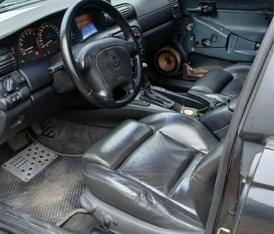 Чорний Опель Омега, об'ємом двигуна 2.5 л та пробігом 3 тис. км за 1750 $, фото 5 на Automoto.ua