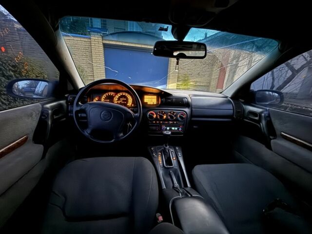 Черный Опель Омега, объемом двигателя 2.5 л и пробегом 365 тыс. км за 2200 $, фото 7 на Automoto.ua