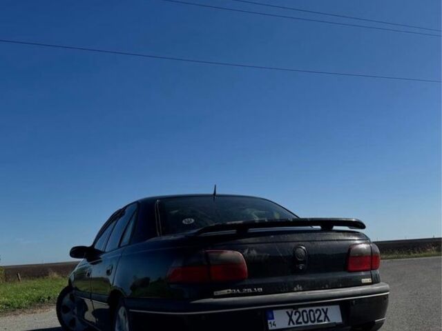 Опель Омега 1994 в Червонограде на Automoto.ua Черный Опель Омега, объемом двигателя 2.5 л и пробегом 450 тыс. км за 2000 $, фото 3 на Automoto.ua