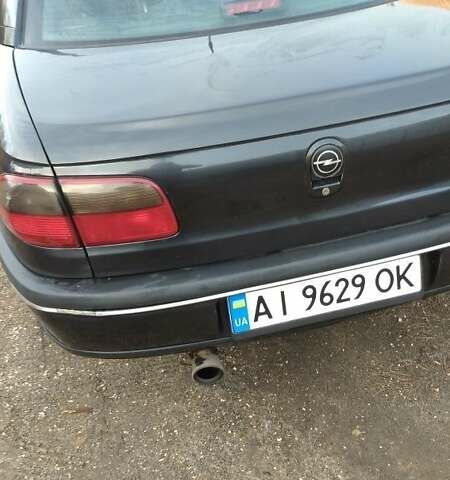 Черный Опель Омега, объемом двигателя 2.5 л и пробегом 300 тыс. км за 2900 $, фото 5 на Automoto.ua