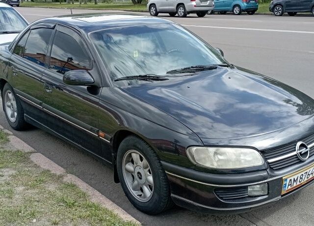 Черный Опель Омега, объемом двигателя 2.5 л и пробегом 311 тыс. км за 2299 $, фото 6 на Automoto.ua
