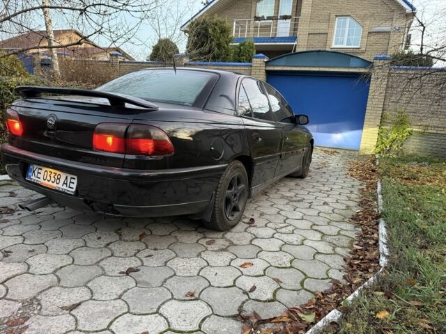 Черный Опель Омега, объемом двигателя 2.5 л и пробегом 365 тыс. км за 2200 $, фото 4 на Automoto.ua