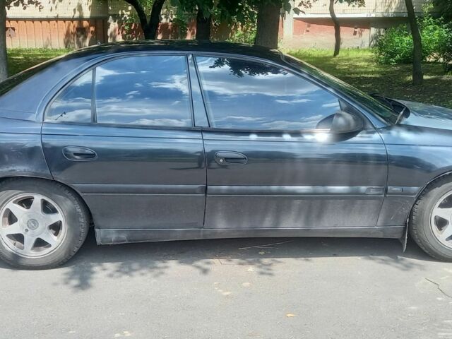 Чорний Опель Омега, об'ємом двигуна 0 л та пробігом 380 тис. км за 1900 $, фото 4 на Automoto.ua