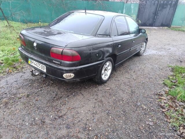 Чорний Опель Омега, об'ємом двигуна 2.5 л та пробігом 350 тис. км за 1650 $, фото 2 на Automoto.ua