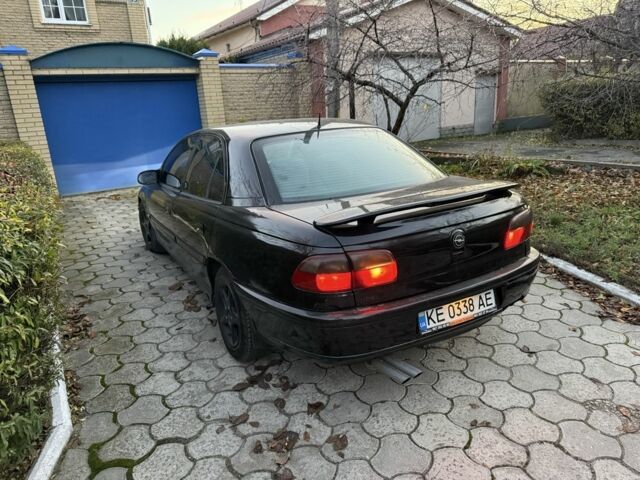 Черный Опель Омега, объемом двигателя 2.5 л и пробегом 365 тыс. км за 2200 $, фото 5 на Automoto.ua