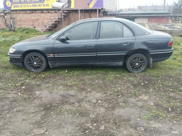 Чорний Опель Омега, об'ємом двигуна 2 л та пробігом 1 тис. км за 1187 $, фото 1 на Automoto.ua