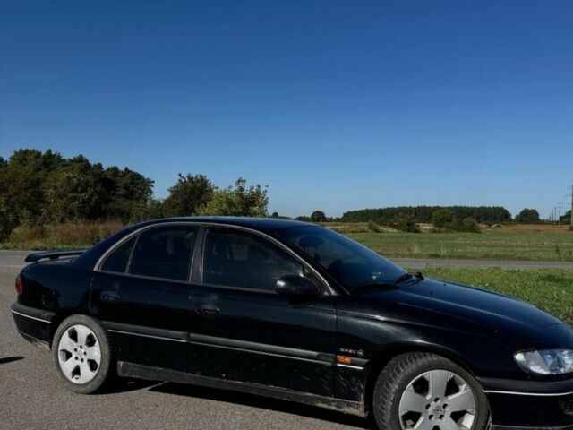 Опель Омега 1994 в Червонограде на Automoto.ua Черный Опель Омега, объемом двигателя 2.5 л и пробегом 450 тыс. км за 2000 $, фото 4 на Automoto.ua