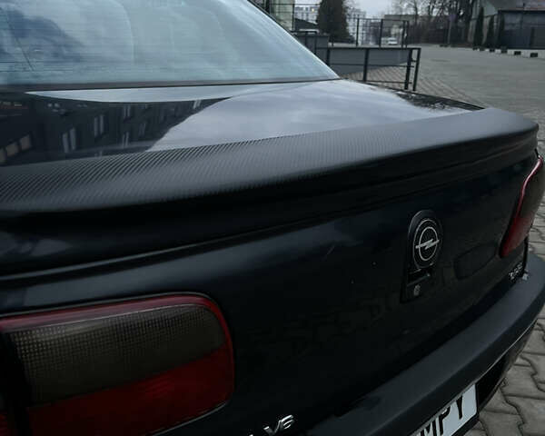 Черный Опель Омега, объемом двигателя 2.5 л и пробегом 300 тыс. км за 2200 $, фото 11 на Automoto.ua