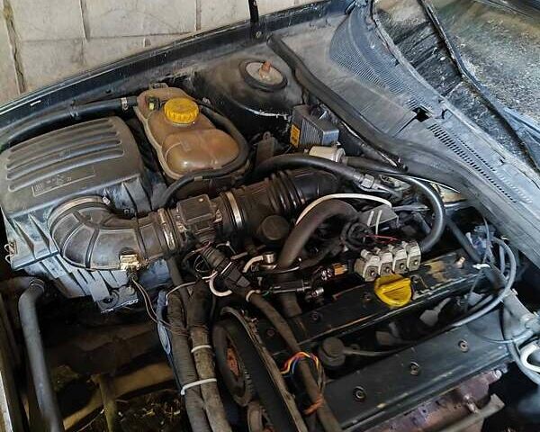 Черный Опель Омега, объемом двигателя 2.5 л и пробегом 999 тыс. км за 850 $, фото 3 на Automoto.ua