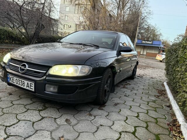 Черный Опель Омега, объемом двигателя 2.5 л и пробегом 365 тыс. км за 2200 $, фото 2 на Automoto.ua