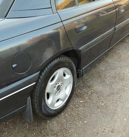 Черный Опель Омега, объемом двигателя 2.5 л и пробегом 300 тыс. км за 2900 $, фото 4 на Automoto.ua