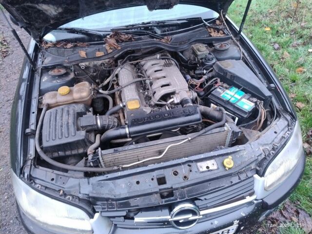 Чорний Опель Омега, об'ємом двигуна 2.5 л та пробігом 350 тис. км за 1650 $, фото 6 на Automoto.ua