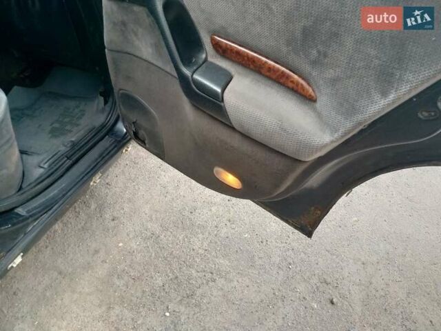 Черный Опель Омега, объемом двигателя 2.5 л и пробегом 200 тыс. км за 1400 $, фото 7 на Automoto.ua