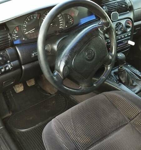 Черный Опель Омега, объемом двигателя 2.5 л и пробегом 300 тыс. км за 2900 $, фото 16 на Automoto.ua