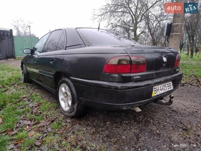 Чорний Опель Омега, об'ємом двигуна 2.5 л та пробігом 350 тис. км за 1650 $, фото 6 на Automoto.ua
