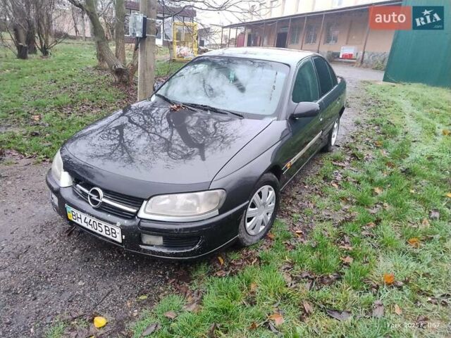 Чорний Опель Омега, об'ємом двигуна 2.5 л та пробігом 350 тис. км за 1650 $, фото 4 на Automoto.ua