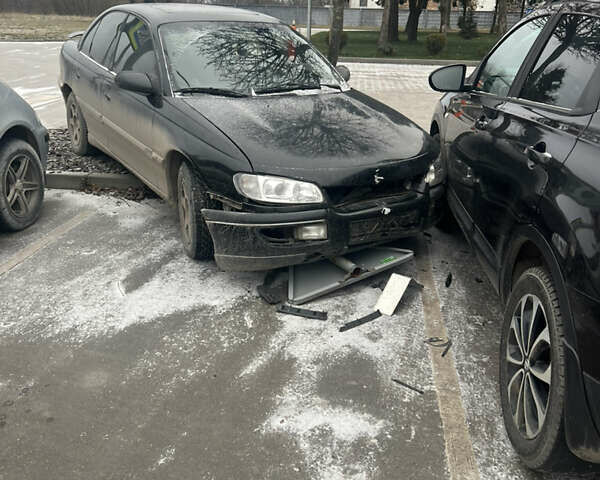 Черный Опель Омега, объемом двигателя 2.5 л и пробегом 470 тыс. км за 1200 $, фото 2 на Automoto.ua