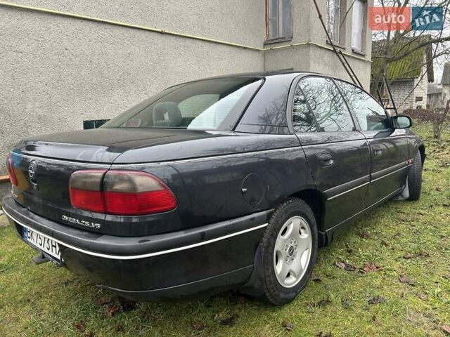 Черный Опель Омега, объемом двигателя 2.5 л и пробегом 274 тыс. км за 2000 $, фото 3 на Automoto.ua