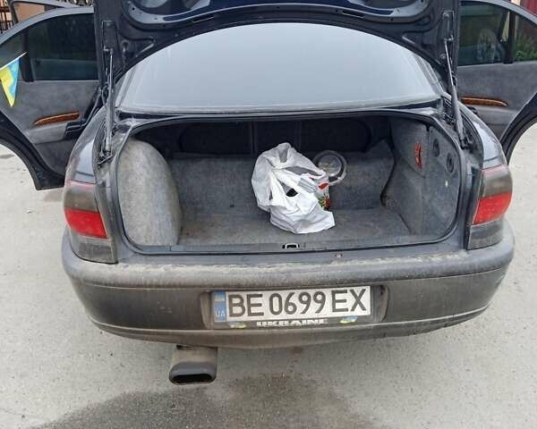 Черный Опель Омега, объемом двигателя 2.5 л и пробегом 328 тыс. км за 3000 $, фото 12 на Automoto.ua
