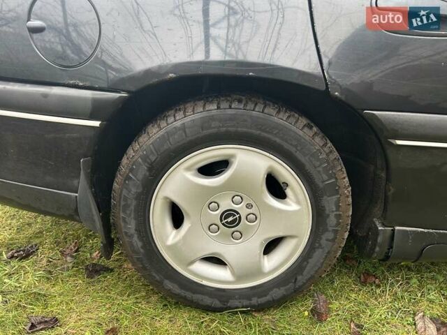 Черный Опель Омега, объемом двигателя 2.5 л и пробегом 274 тыс. км за 2000 $, фото 8 на Automoto.ua