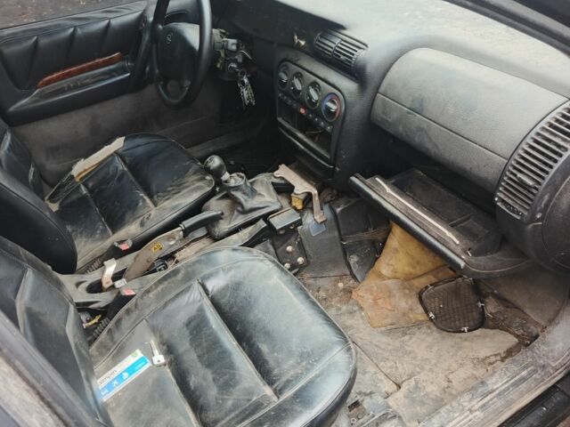 Черный Опель Омега, объемом двигателя 2 л и пробегом 370 тыс. км за 850 $, фото 6 на Automoto.ua