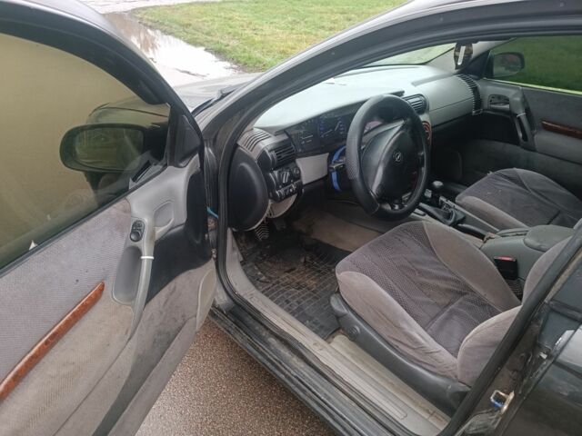 Черный Опель Омега, объемом двигателя 2 л и пробегом 300 тыс. км за 1500 $, фото 4 на Automoto.ua