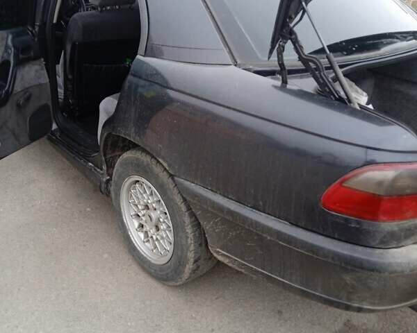 Черный Опель Омега, объемом двигателя 2.5 л и пробегом 328 тыс. км за 3000 $, фото 13 на Automoto.ua