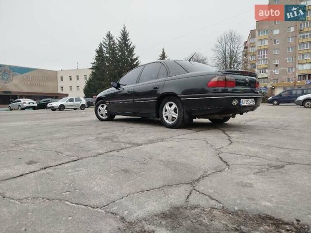 Черный Опель Омега, объемом двигателя 3 л и пробегом 280 тыс. км за 3300 $, фото 9 на Automoto.ua