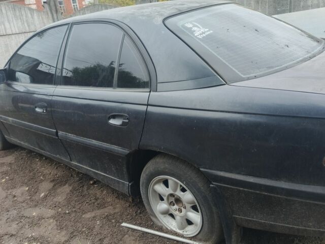 Черный Опель Омега, объемом двигателя 2 л и пробегом 370 тыс. км за 850 $, фото 2 на Automoto.ua