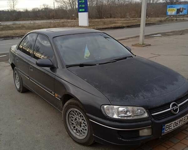Черный Опель Омега, объемом двигателя 2.5 л и пробегом 328 тыс. км за 3000 $, фото 1 на Automoto.ua