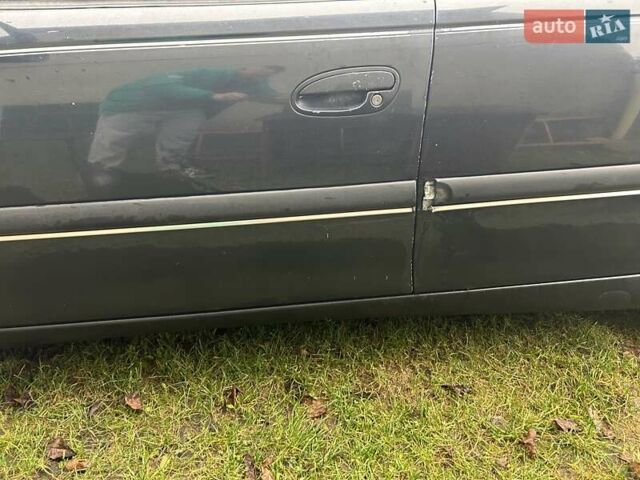 Черный Опель Омега, объемом двигателя 2.5 л и пробегом 274 тыс. км за 2000 $, фото 5 на Automoto.ua