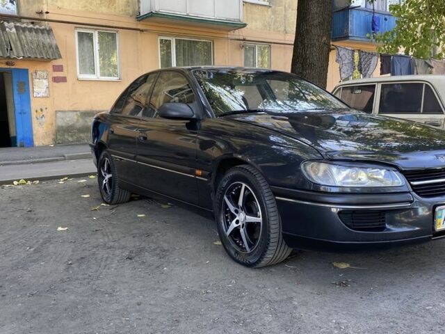 Черный Опель Омега, объемом двигателя 2 л и пробегом 169 тыс. км за 3800 $, фото 4 на Automoto.ua