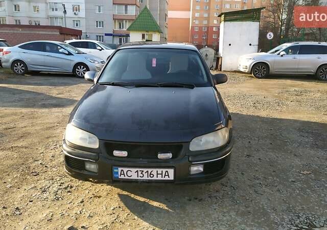 Чорний Опель Омега, об'ємом двигуна 2.5 л та пробігом 400 тис. км за 1650 $, фото 3 на Automoto.ua