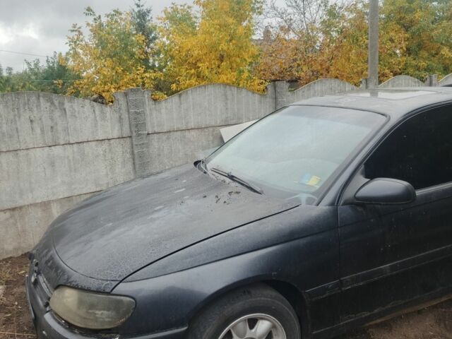 Черный Опель Омега, объемом двигателя 2 л и пробегом 370 тыс. км за 850 $, фото 1 на Automoto.ua