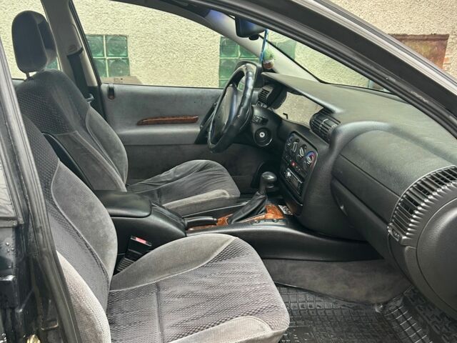 Черный Опель Омега, объемом двигателя 2.5 л и пробегом 274 тыс. км за 2000 $, фото 10 на Automoto.ua