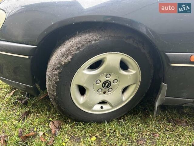 Черный Опель Омега, объемом двигателя 2.5 л и пробегом 274 тыс. км за 2000 $, фото 7 на Automoto.ua