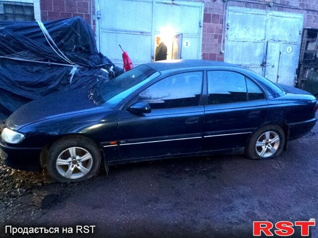 Чорний Опель Омега, об'ємом двигуна 2 л та пробігом 167 тис. км за 900 $, фото 1 на Automoto.ua