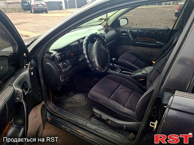 Чорний Опель Омега, об'ємом двигуна 2 л та пробігом 240 тис. км за 800 $, фото 6 на Automoto.ua