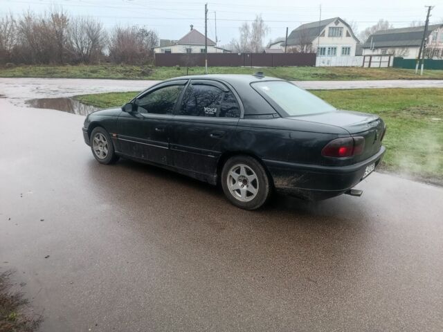 Черный Опель Омега, объемом двигателя 2 л и пробегом 300 тыс. км за 1500 $, фото 3 на Automoto.ua