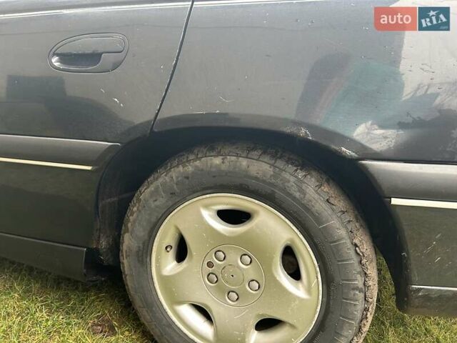 Черный Опель Омега, объемом двигателя 2.5 л и пробегом 274 тыс. км за 2000 $, фото 6 на Automoto.ua