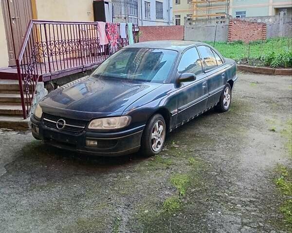 Черный Опель Омега, объемом двигателя 2.5 л и пробегом 1 тыс. км за 1600 $, фото 2 на Automoto.ua