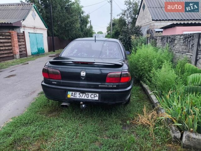 Черный Опель Омега, объемом двигателя 2.5 л и пробегом 500 тыс. км за 800 $, фото 1 на Automoto.ua