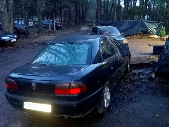 Черный Опель Омега, объемом двигателя 2 л и пробегом 167 тыс. км за 900 $, фото 2 на Automoto.ua